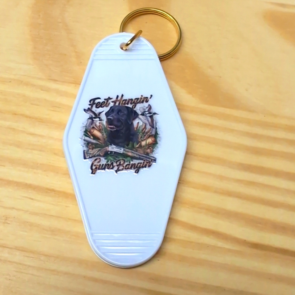 Feet hangin guns bangin white key chain